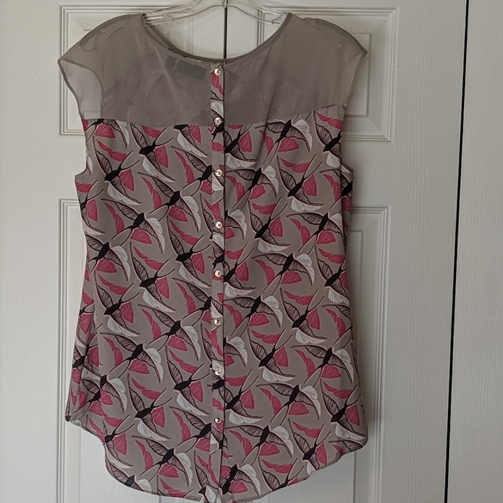 APT. 9 top size L